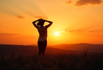 Fototapeta premium Prayer woman worship God in the morning with sunrise sky background 
