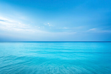 Calm turquoise ocean, sunny sky, tranquil beach background, travel brochure
