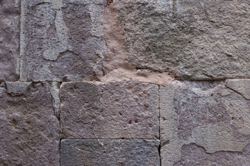 Closeup of aged stone wall texture