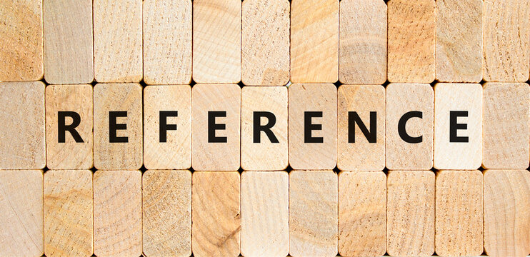 Reference symbol. Concept word Reference on beautiful wooden blocks. Beautiful wooden blocks background. Business reference concept. Copy space.