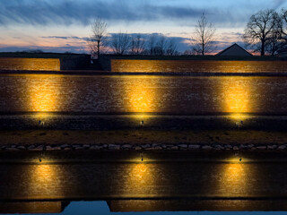 ancient brick walls illuminated by spotlights