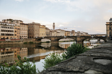 Fototapeta premium Timeless Florence: The Arno River and Its Historic Bridges