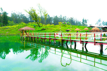 Wooden bridge in Laguna del Amor in Chota