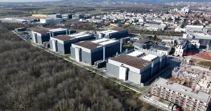 Aerial views on the FRA 4 data centers in Germany. Intenret infrastructure, cloud computing and information technology.