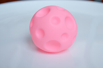 hand holding sensory textured ball babies toddlers tactile stimulation sensory play early childhood...