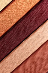 Fototapeta premium Vibrant close-up of rich burgundy eyeshadow showcasing detailed textures and luxurious finishes in a well-lit setting