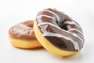 Delicious chocolate donuts on a white table. Food concept.