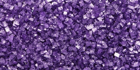 Shimmering close-up of sparkling purple crystals with a textured surface and reflective highlights