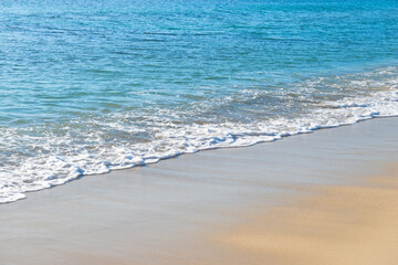 Soft wave of the sea on the sandy beach