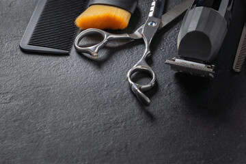 Professional Hairdressing Tools on Dark Background