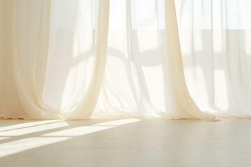 Natural light filters through sheer curtains in a bright contemporary interior space