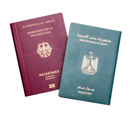 German and Egyptian Passports, Migration Concept, on White Background