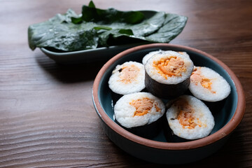 Close-up of dim sum setup sushi,noodles and egg