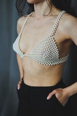 This Fashionable PearlBrassiere showcases a striking Contemporary Style that captivates attention