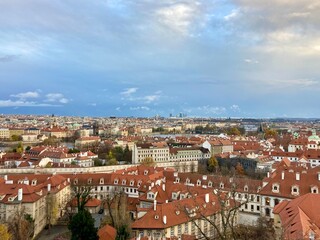 Fototapeta premium Panorama of Prague with red rooftops
