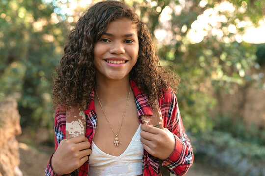 Smiling Teen Girl Enjoying Nature Walk