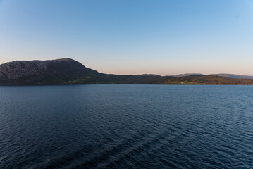 Beautiful photo of the sea waves and mountain