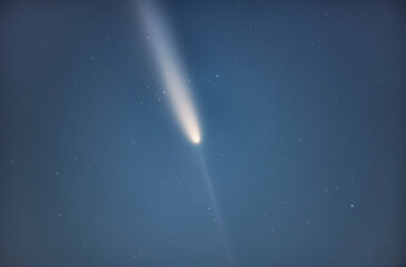 Comet 2023 A3 Tsuchinshan ATLAS Interstellar comet. A comet with a long tail crossing space. Comet stars and night sky © Hector