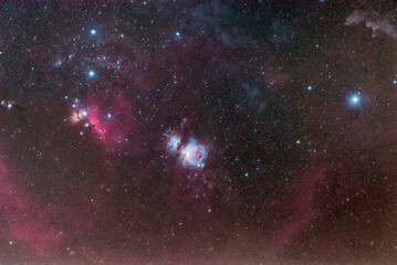 Orion constellation. The Milky Way with a telescope. The great orion nebula. Alnitak, alnilam and mintaka, the three wise men abstract space background