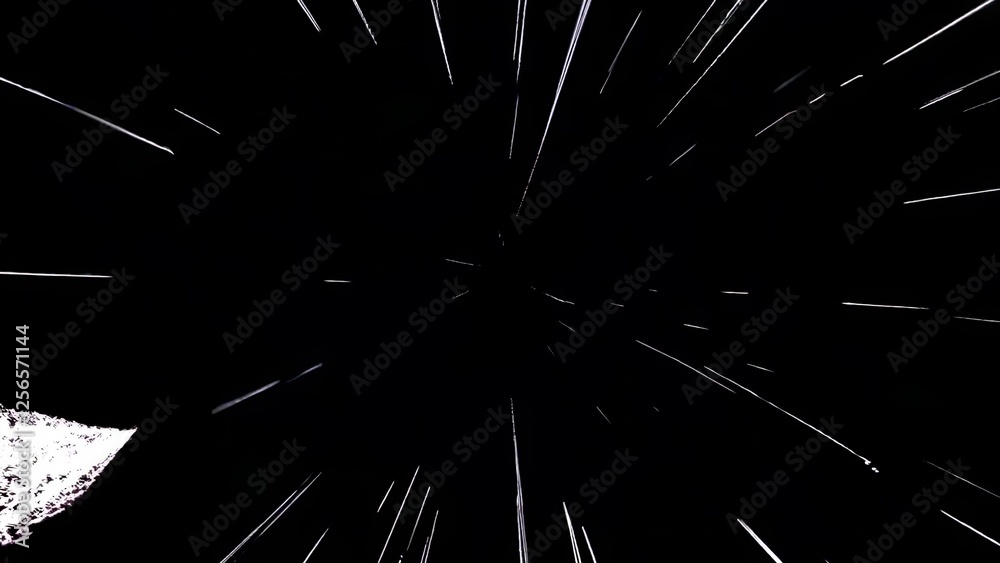 Poster white streaks of light create a dynamic sense of movement and speed against a dark background, evoki