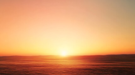 Obraz premium Sunset over a vast and rolling orange landscape