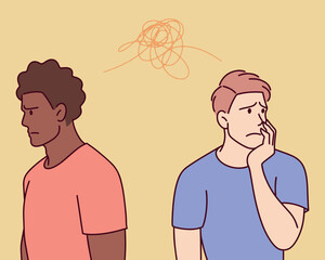 Young white and Black men standing apart, lost in their thoughts. Depicts emotional disconnection.
