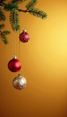 Ornaments suspended from a branch against a warm gold background, , gold ornaments, winter decor