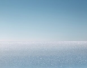 Obraz premium A serene landscape featuring a sparkling ocean under a clear blue sky.