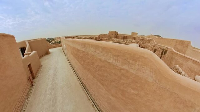 Panoramic aerial view of Diriyah, a UNESCO World Heritage site near Riyadh, showcasing the unique mud-brick architecture and the restoration efforts preserving Saudi Arabia's cultural heritage