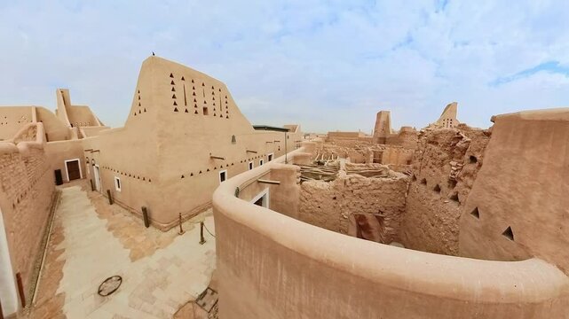 aerial view featuring traditional mud-brick architecture, ancient alleyways of Diriyah, a UNESCO World Heritage site near Riyadh, reflect the region's rich cultural heritage of Saudi Arabia
