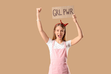 Young pin-up woman with GRL PWR sign on beige background. Women's History Month