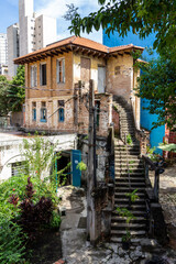 SÃO PAULO, SP, BRAZIL - JANUARY 25, 2025: Brick-walled house with staircase in the historic Vila...