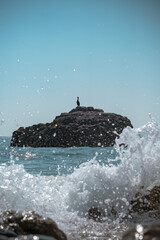 waves crashing on rocks