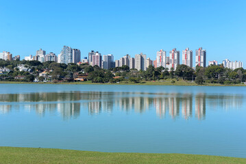 Fototapeta premium city, horizon, river, architecture, building, distance, cityscape, center, sky, night, park, panorama, perspective, bridge, lake
