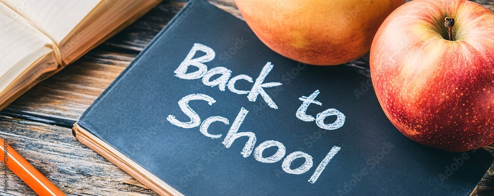 Aufkleber Back to school theme with apples and a notebook featuring the message back to school written in chalk