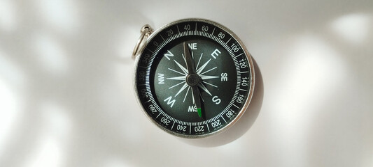 Navigating the path compass close-up photography in natural light environment © denphumi