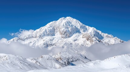 Obraz premium Snowy mountain peak, winter landscape, clear sky, cloud cover, travel poster