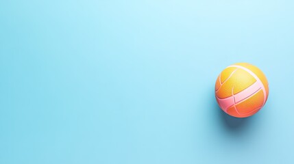 Vibrant orange and pink basketball resting on a soft blue background, perfect for sports themes