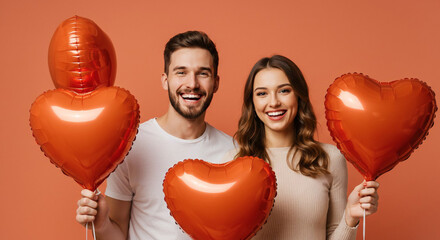 young couple with heart balloons