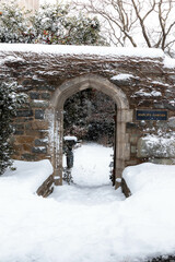 Snow Covered Entryway to a Garden