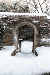 Snow Covered Entryway to a Garden