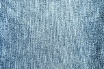 Texture of blue jeans as background, top view