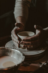 Male Hands Shaping Clay Pot