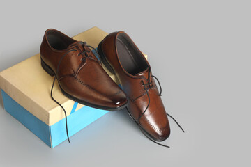 Classic leather formal Shoes isolated on gray background	
