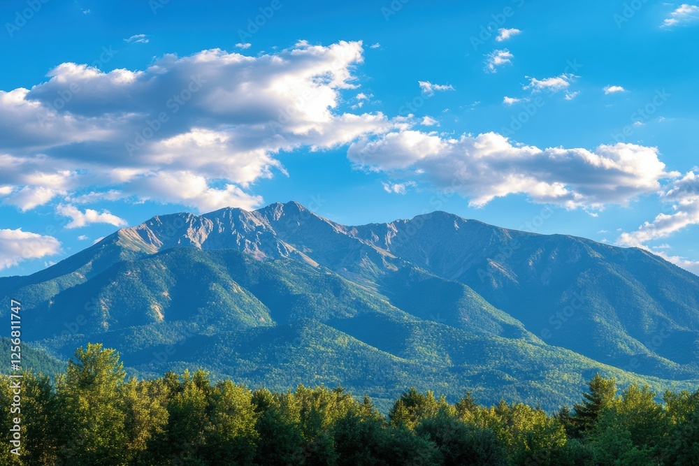 Poster Majestic mountain range rising against a backdrop of soft clouds and blue sky with ample space for text. Generative AI