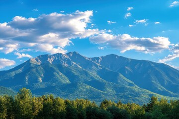 Majestic mountain range rising against a backdrop of soft clouds and blue sky with ample space for text. Generative AI