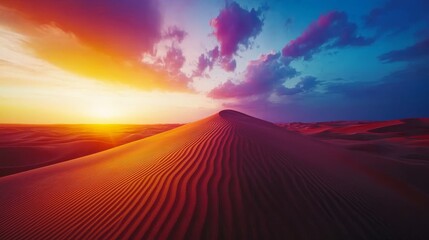 Vibrant sunset over majestic desert dunes, creating a breathtaking landscape of warm colors and textured sand.