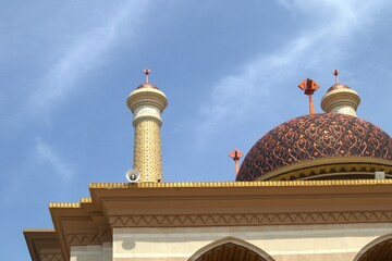 Beautiful Dome and Mosque Tower Architecture with a blue sky background