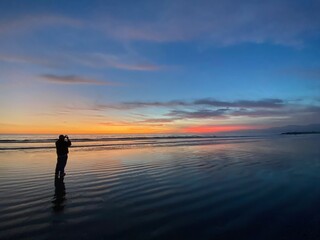 Sunset on the beach at low tide