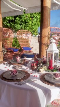 Dining table on Sunset beach, ROMANTIC VALENTINE'S DAY oceanfront AT LUXURY HOTEL